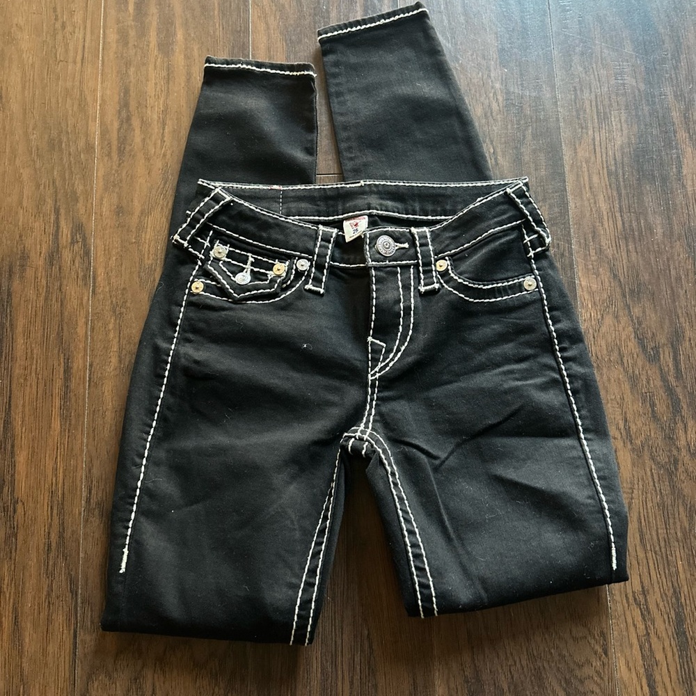 25” True Religion skinny jeans